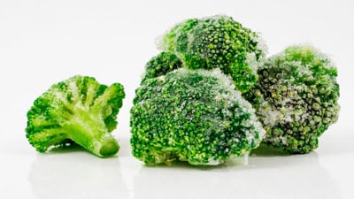 A close up of some broccoli on a table